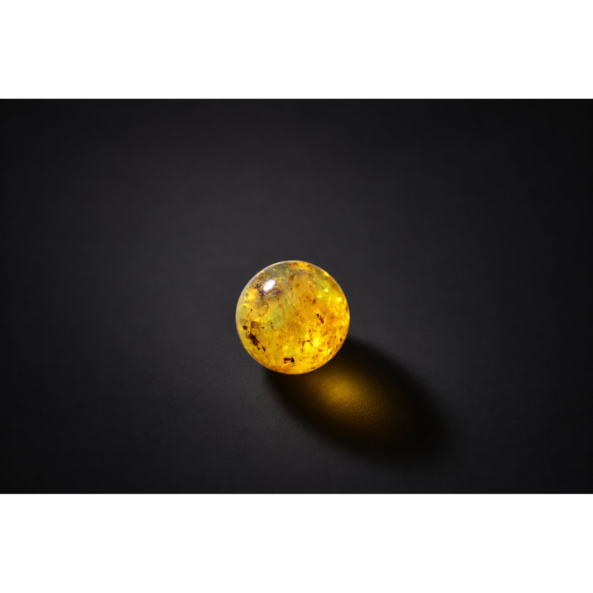 Natural yellow blue Dominican amber sphere/ball 21mm – photo 9