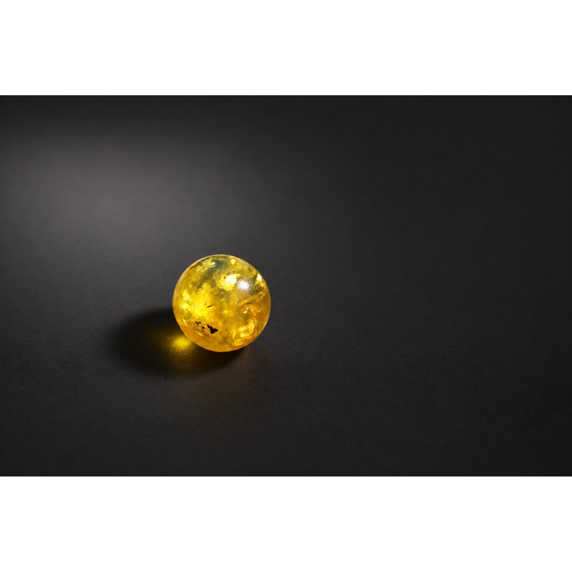 Untreated olive green yellow Dominican amber sphere/ball 18.7mm – photo 4