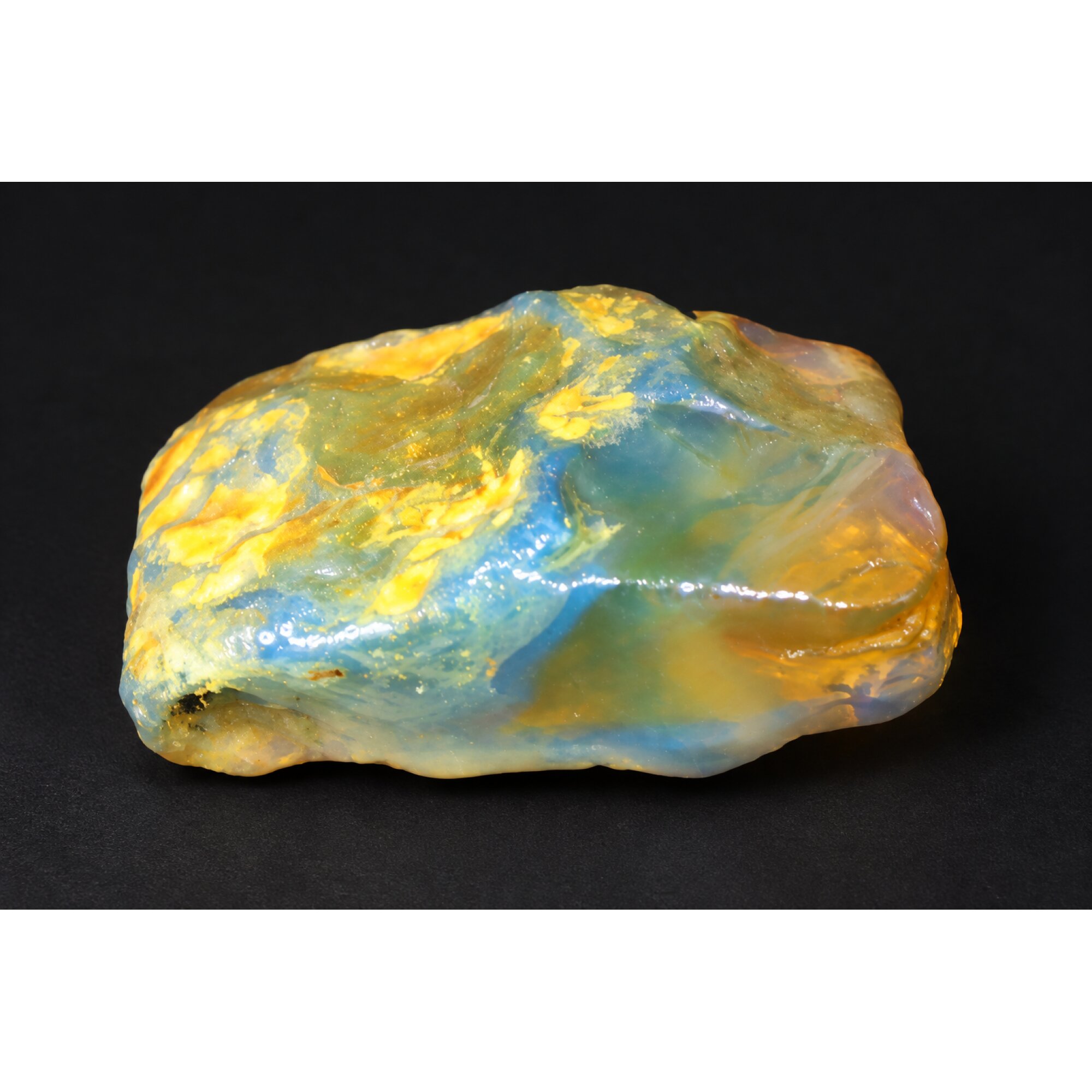 Naturally formed orange blue rough specimen Dominican amber 38mm – photo 9