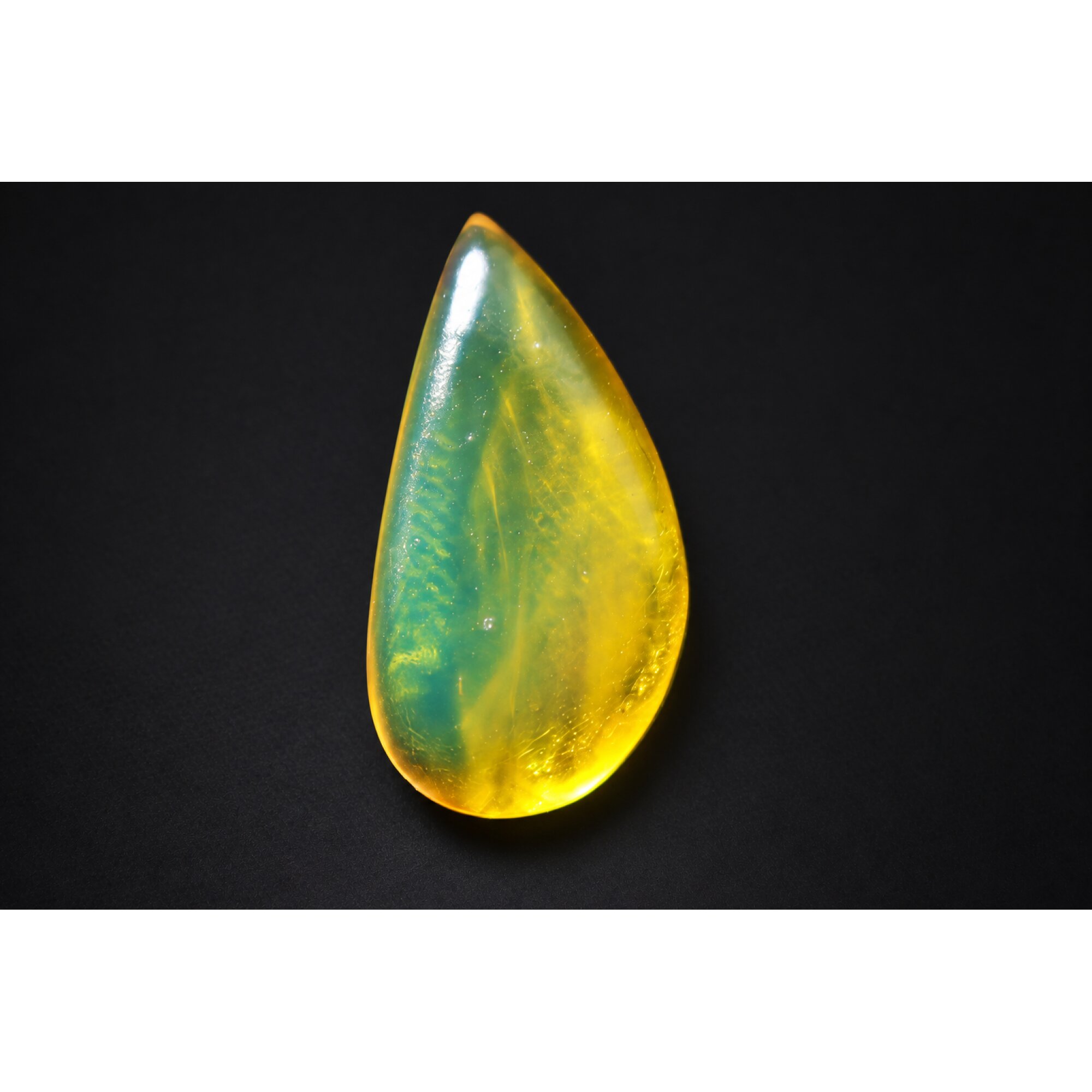 Authentic green yellow polished Dominican amber 0.8g – photo 4